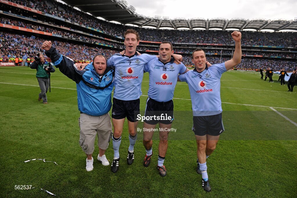 18 September 2011; Dublin players, from left, Kevin Nolan, Paul Casey and Paul Conlon celebrate victory after the game with supporter Stephen Molloy. GAA Football All-Ireland Senior Championship Final, Kerry v Dublin, Croke Park, Dublin. Picture credit: Stephen McCarthy / SPORTSFILE