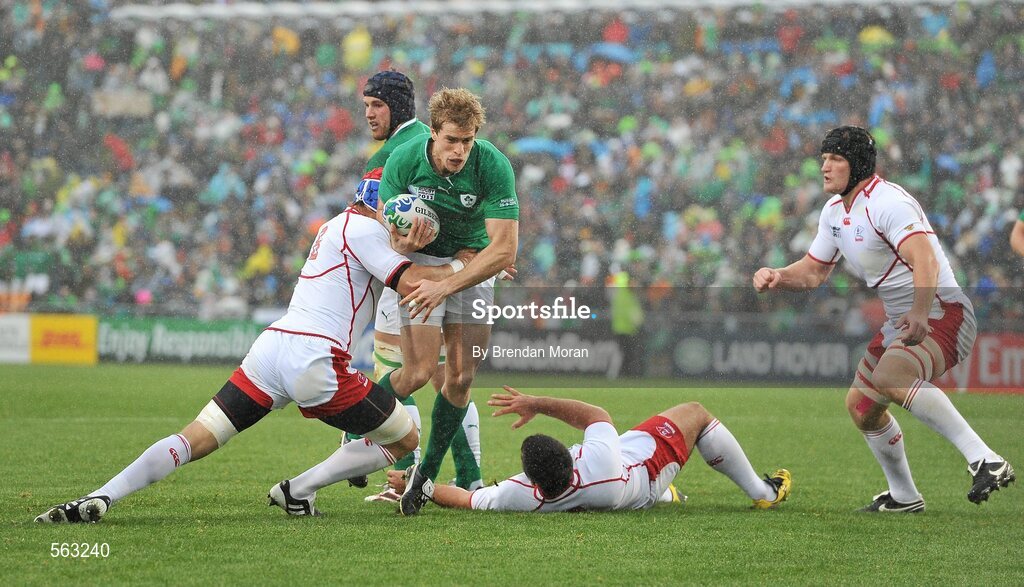 25 September 2011; Andrew Trimble, Ireland, is tackled by Artem Fatakhov, Russia. 2011 Rugby World Cup, Pool C, Ireland v Russia, Rotorua International Stadium, Rotorua, New Zealand. Picture credit: Brendan Moran / SPORTSFILE