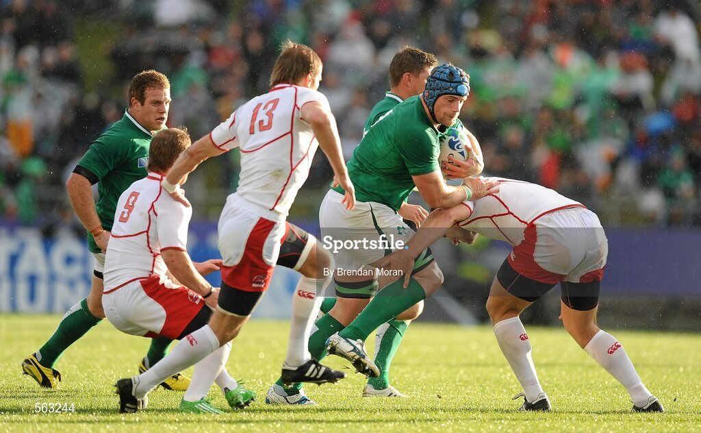 25 September 2011; Jamie Heaslip, Ireland, is tackled by Victor Gresev, Russia. 2011 Rugby World Cup, Pool C, Ireland v Russia, Rotorua International Stadium, Rotorua, New Zealand. Picture credit: Brendan Moran / SPORTSFILE