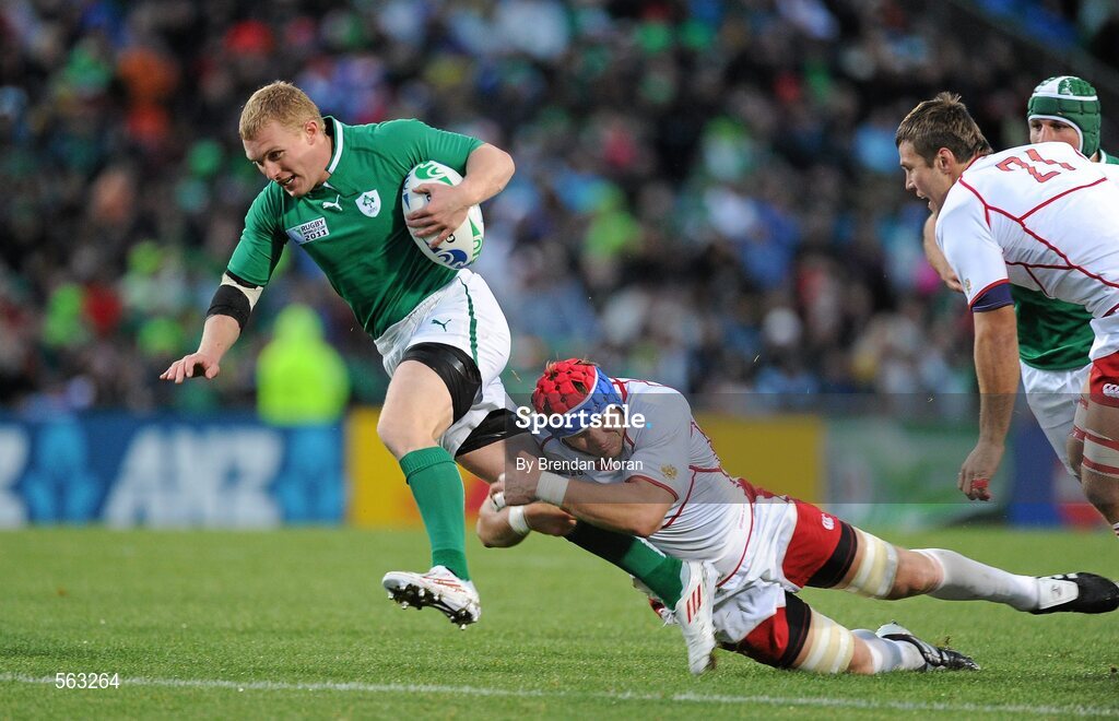 25 September 2011; Keith Earls, Ireland, breaks through the tackle of Artem Fatakhov, Russia, on the way to scoring his second and his side's 6th try. 2011 Rugby World Cup, Pool C, Ireland v Russia, Rotorua International Stadium, Rotorua, New Zealand. Picture credit: Brendan Moran / SPORTSFILE