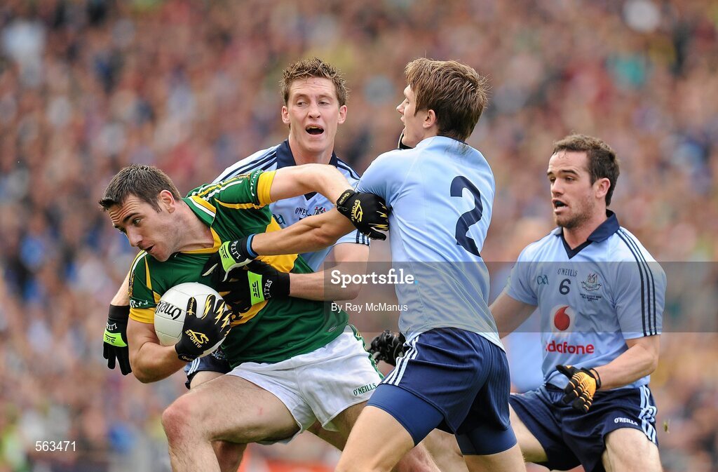18 September 2011; Declan O'Sullivan, Kerry, in action against Dublin's Kevin Nolan, left, Michael Fitzsimons, 2, and Ger Brennan. GAA Football All-Ireland Senior Championship Final, Kerry v Dublin, Croke Park, Dublin. Picture credit: Ray McManus / SPORTSFILE
