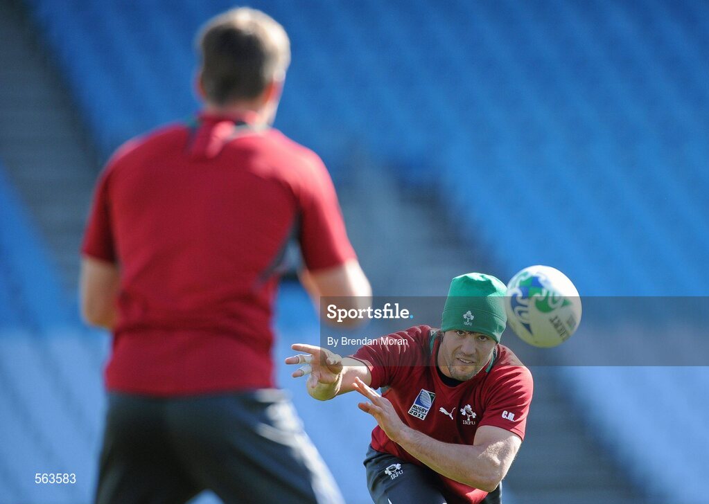28 September 2011; Ireland scrum-half Conor Murray passes to team-mate Ronan O'Gara during squad training ahead of their 2011 Rugby World Cup, Pool C, game against Italy on Sunday. Ireland Rugby Squad Training, Carisbrook Stadium, Dunedin, New Zealand. Picture credit: Brendan Moran / SPORTSFILE