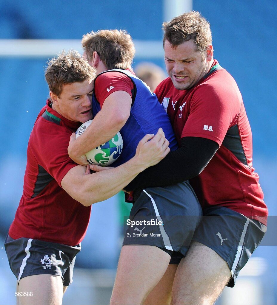 28 September 2011; Ireland Brian O'Driscoll and Mike Ross tackle Eoin Reddan during squad training ahead of their 2011 Rugby World Cup, Pool C, game against Italy on Sunday. Ireland Rugby Squad Training, Carisbrook Stadium, Dunedin, New Zealand. Picture credit: Brendan Moran / SPORTSFILE