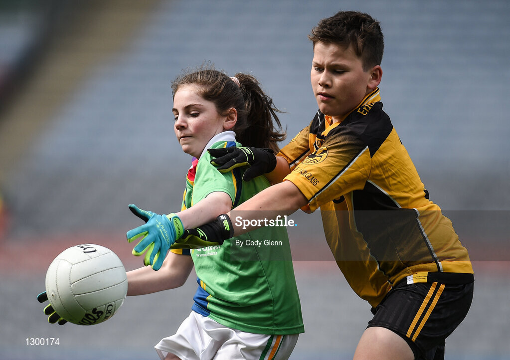 12 April 2017; Caoimhe Cullen, representing St. Brigids GAA Club, Co Roscommon, in action against Ethan Carden, representing Enniscrone Kilglass GAA, Co Sligo, during The Go Games Provincial Days in partnership with Littlewoods Ireland Day 3 at Croke Park in Dublin. Photo by Cody Glenn/Sportsfile
