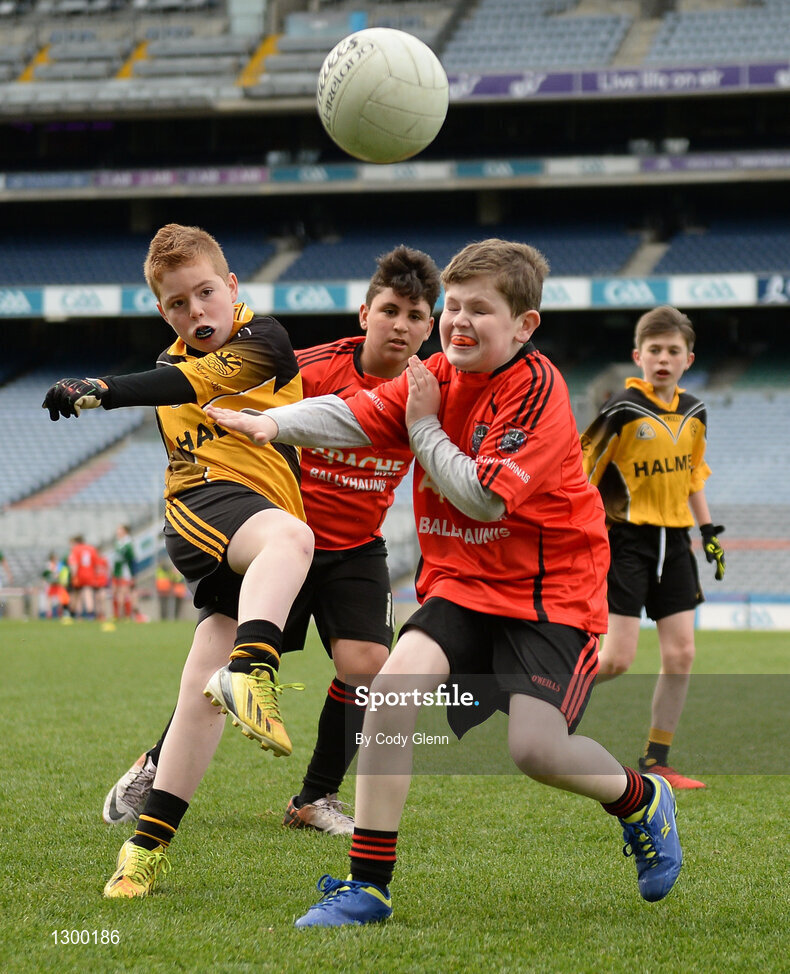 12 April 2017; Darragh Long, representing Enniscrone GAA Club, Co Sligo, takes a shot despite the attempts of Jason Lyons, representing Ballyhaunis GAA Club, Co Mayo, during The Go Games Provincial Days in partnership with Littlewoods Ireland Day 3 at Croke Park in Dublin. Photo by Cody Glenn/Sportsfile