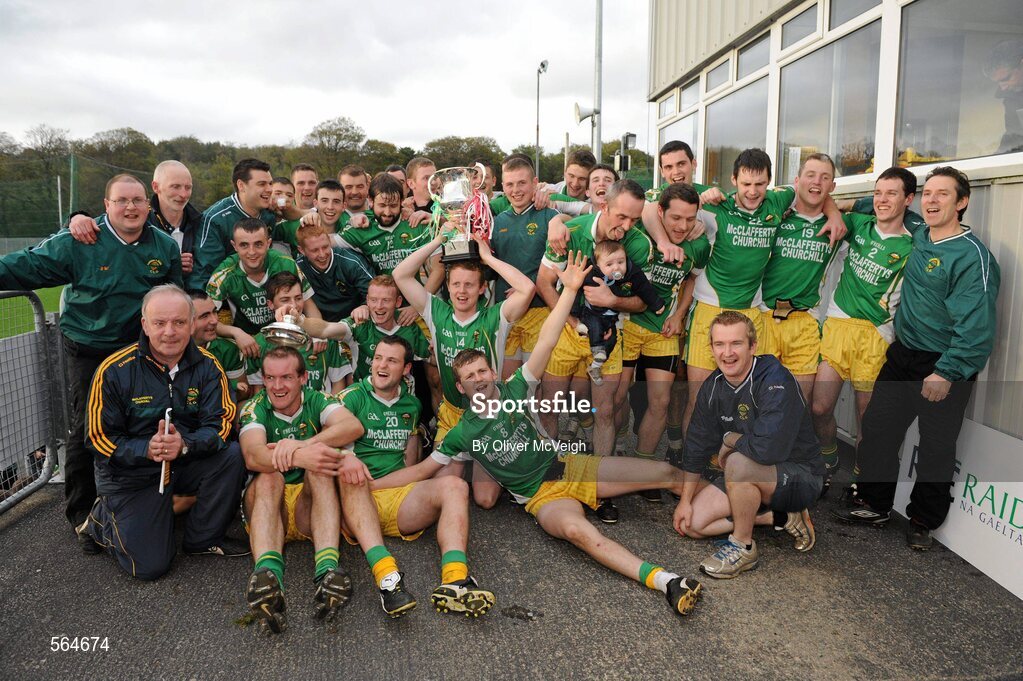 2 October 2011; The Glenswilly players and management celebrate with the Dr Maguire cup. Radio Na Gaeltachta Donegal County Senior Football Championship Final, Glenswilly v St. Michael's, MacCumhaill Park, Ballybofey, Co. Donegal. Picture credit: Oliver McVeigh / SPORTSFILE