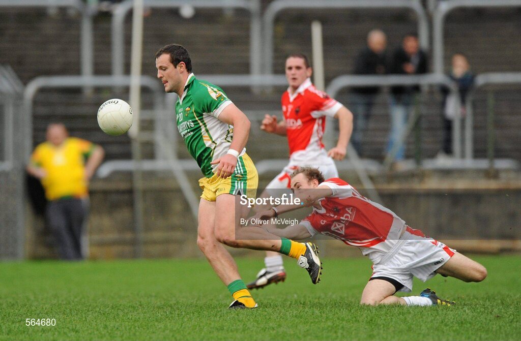 2 October 2011; Michael Murphy, Glenswilly, in action against Michael McGinley, St. Michael's, on his way to scoring his side's goal. Radio Na Gaeltachta Donegal County Senior Football Championship Final, Glenswilly v St. Michael's, MacCumhaill Park, Ballybofey, Co. Donegal. Picture credit: Oliver McVeigh / SPORTSFILE