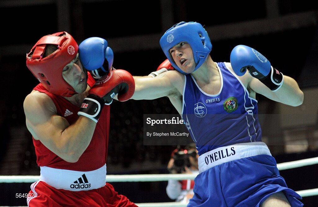 4 October 2011; Joe Ward, Moate B.C., Westmeath, representing Ireland, right, exchanges punches with Ehsan Rouzbahani, Iran, during their 81kg bout. Ward was defeated on countback after the bout ended 15-15. 2011 AIBA World Boxing Championships - Last 16, Joe Ward v Ehsan Rouzbahani. Heydar Aliyev Sports and Exhibition Complex, Baku, Azerbaijan. Picture credit: Stephen McCarthy / SPORTSFILE