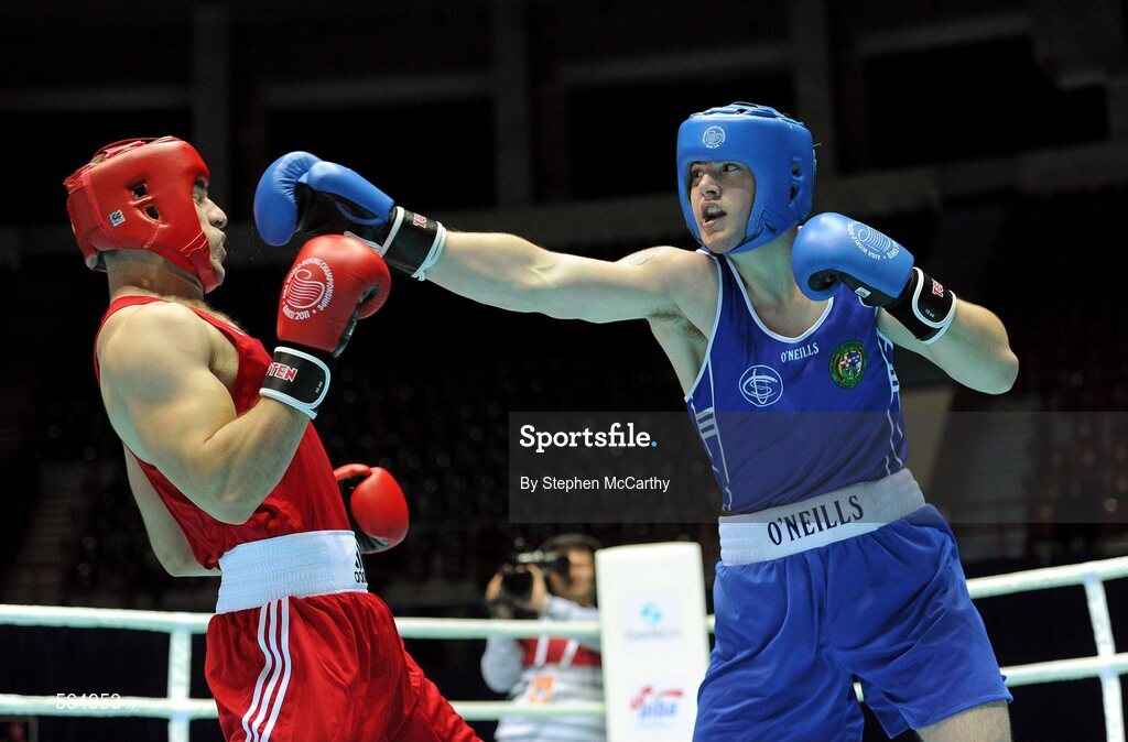 4 October 2011; Joe Ward, Moate B.C., Westmeath, representing Ireland, right, exchanges punches with Ehsan Rouzbahani, Iran, during their 81kg bout. Ward was defeated on countback after the bout ended 15-15. 2011 AIBA World Boxing Championships - Last 16, Joe Ward v Ehsan Rouzbahani. Heydar Aliyev Sports and Exhibition Complex, Baku, Azerbaijan. Picture credit: Stephen McCarthy / SPORTSFILE