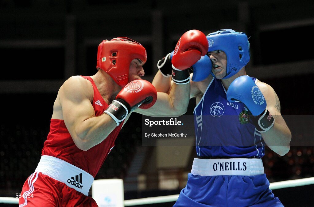 4 October 2011; Joe Ward, Moate B.C., Westmeath, representing Ireland, right, exchanges punches with Ehsan Rouzbahani, Iran, during their 81kg bout. Ward was defeated on countback after the bout ended 15-15. 2011 AIBA World Boxing Championships - Last 16, Joe Ward v Ehsan Rouzbahani. Heydar Aliyev Sports and Exhibition Complex, Baku, Azerbaijan. Picture credit: Stephen McCarthy / SPORTSFILE