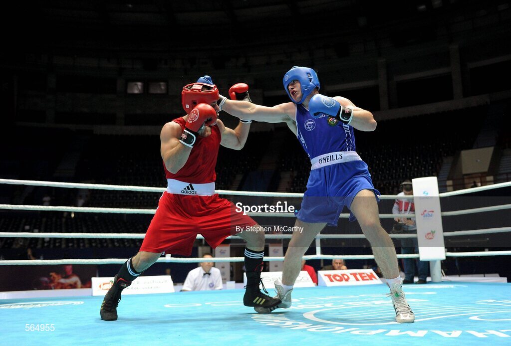 4 October 2011; Joe Ward, Moate B.C., Westmeath, representing Ireland, right, exchanges punches with Ehsan Rouzbahani, Iran, during their 81kg bout. Ward was defeated on countback after the bout ended 15-15. 2011 AIBA World Boxing Championships - Last 16, Joe Ward v Ehsan Rouzbahani. Heydar Aliyev Sports and Exhibition Complex, Baku, Azerbaijan. Picture credit: Stephen McCarthy / SPORTSFILE