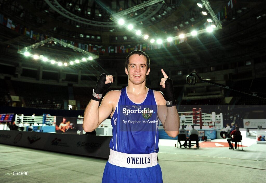 4 October 2011; Darren O'Neill, Paulstown B.C., Kilkenny, representing Ireland, celebrates his victory over Mladen Manev, Bulgaria, following their 75kg bout. O'Neill's 19-12 victory ensured progression to the Quarter-Finals and also qualification for the London 2012 Olympic Games. 2011 AIBA World Boxing Championships - Last 16, Darren O'Neill v Mladen Manev. Heydar Aliyev Sports and Exhibition Complex, Baku, Azerbaijan. Picture credit: Stephen McCarthy / SPORTSFILE