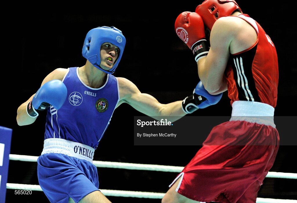 4 October 2011; Darren O'Neill, Paulstown B.C., Kilkenny, representing Ireland, left, exchanges punches with Mladen Manev, Bulgaria, during their 75kg bout. O'Neill's 19-12 victory ensured progression to the Quarter-Finals and also qualification for the London 2012 Olympic Games. 2011 AIBA World Boxing Championships - Last 16, Darren O'Neill v Mladen Manev. Heydar Aliyev Sports and Exhibition Complex, Baku, Azerbaijan. Picture credit: Stephen McCarthy / SPORTSFILE