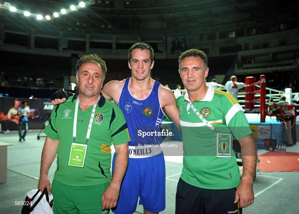 4 October 2011; Darren O'Neill, Paulstown B.C., Kilkenny, representing Ireland, with coaches Billy Walsh, right, and Zaur Antia following 75kg bout victory over Mladen Manev, Bulgaria. O'Neill's 19-12 victory ensured progression to the Quarter-Finals and also qualification for the London 2012 Olympic Games. 2011 AIBA World Boxing Championships - Last 16, Darren O'Neill v Mladen Manev. Heydar Aliyev Sports and Exhibition Complex, Baku, Azerbaijan. Picture credit: Stephen McCarthy / SPORTSFILE