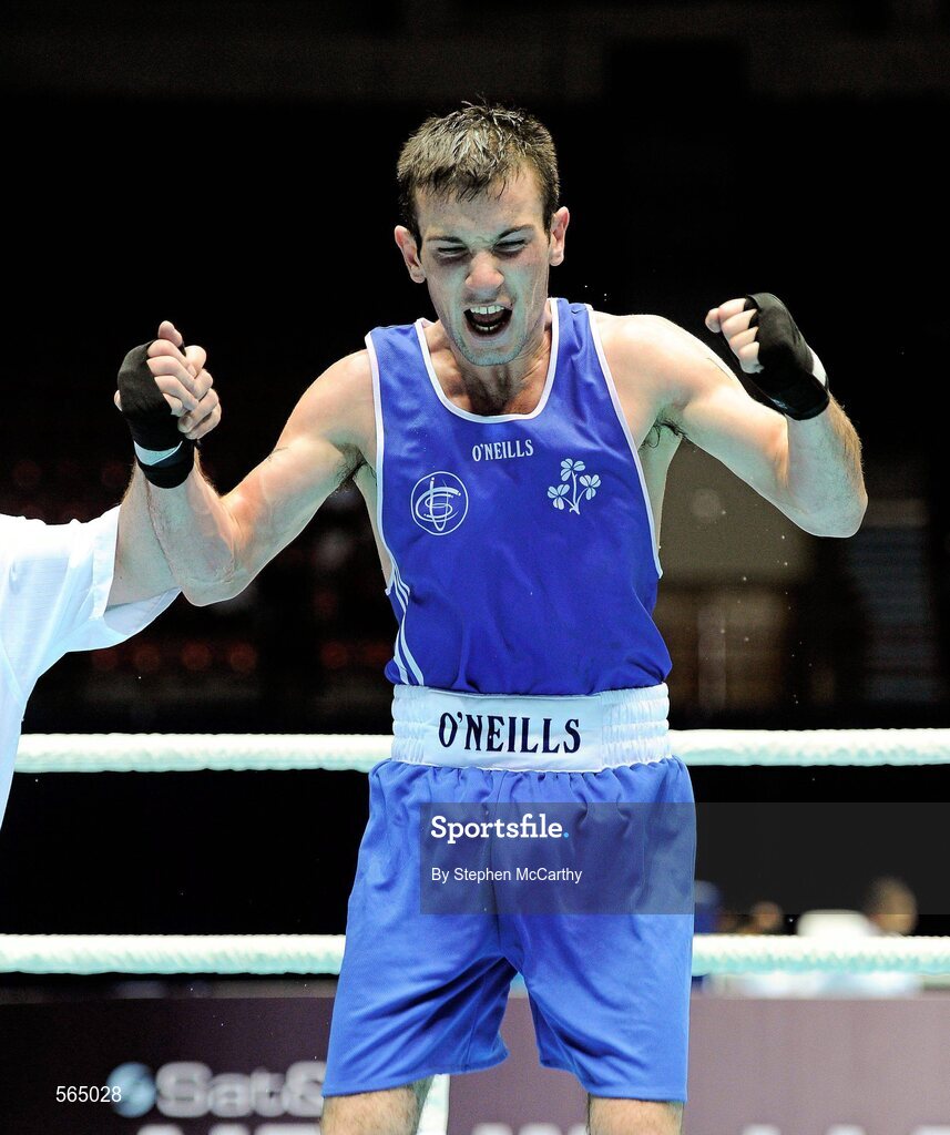 4 October 2011; John Joe Nevin, Cavan B.C., representing Ireland, celebrates victory over Otgondalai Dorjnyambuu, Mongolia, following their 56kg bout. Nevin won the contest on countback after the bout ended 18-18. Nevin's victory ensured progression to the Quarter-Finals and also qualification for the London 2012 Olympic Games. 2011 AIBA World Boxing Championships - Last 16, John Joe Nevin v Otgondalai Dorjnyambuu. Heydar Aliyev Sports and Exhibition Complex, Baku, Azerbaijan. Picture credit: Stephen McCarthy / SPORTSFILE