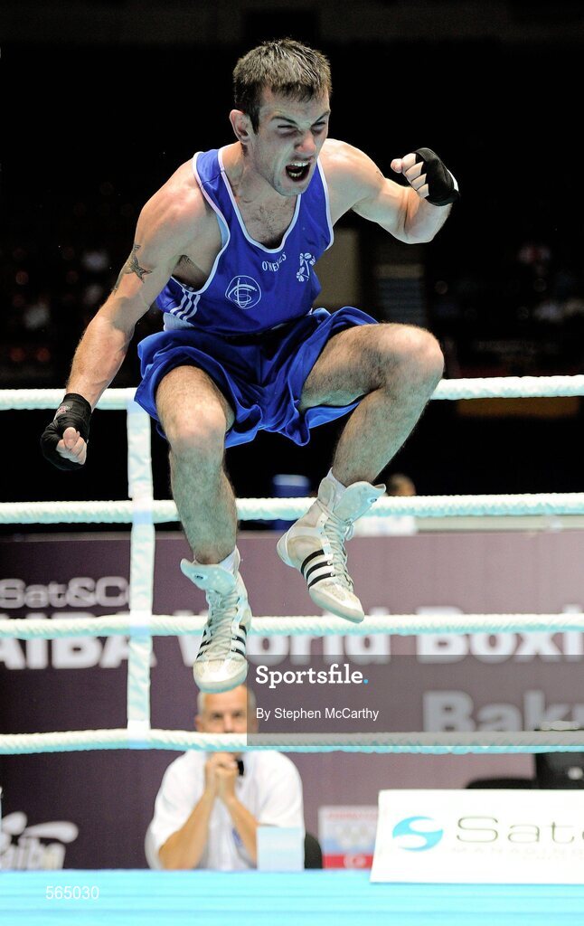 4 October 2011; John Joe Nevin, Cavan B.C., representing Ireland, celebrates victory over Otgondalai Dorjnyambuu, Mongolia, following their 56kg bout. Nevin won the contest on countback after the bout ended 18-18. Nevin's victory ensured progression to the Quarter-Finals and also qualification for the London 2012 Olympic Games. 2011 AIBA World Boxing Championships - Last 16, John Joe Nevin v Otgondalai Dorjnyambuu. Heydar Aliyev Sports and Exhibition Complex, Baku, Azerbaijan. Picture credit: Stephen McCarthy / SPORTSFILE