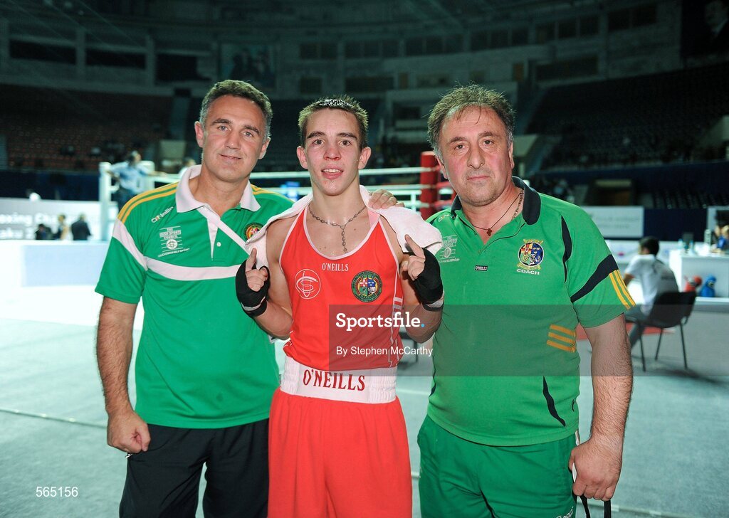 4 October 2011; Michael Conlan, St. John Bosco B.C., Belfast, Antrim, representing Ireland, following his 52kg bout victory over Nordine Oubaali, France, with coaches Billy Walsh and Zaur Antia. Conlan won the contest 20-17 and ensured progression to the Quarter-Finals and also qualification for the London 2012 Olympic Games. 2011 AIBA World Boxing Championships - Last 16, Michael Conlan v Nordine Oubaali. Heydar Aliyev Sports and Exhibition Complex, Baku, Azerbaijan. Picture credit: Stephen McCarthy / SPORTSFILE