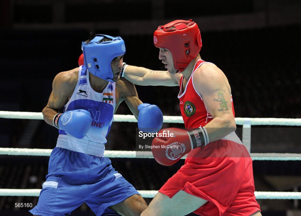 4 October 2011; David Oliver Joyce, St Michael's Athy B.C., Kildare, representing Ireland, right, exchanges punches with Jai Bhagwan, India, during their 60kg bout. Joyce was defeated 32-30. 2011 AIBA World Boxing Championships - Last 16, David Oliver Joyce v Jai Bhagwan. Heydar Aliyev Sports and Exhibition Complex, Baku, Azerbaijan. Picture credit: Stephen McCarthy / SPORTSFILE