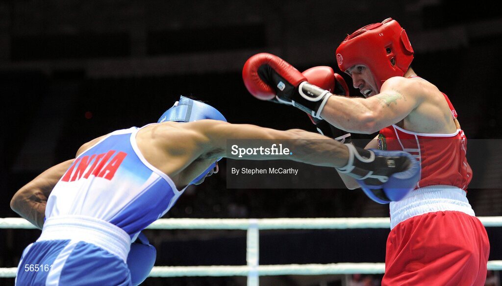 4 October 2011; David Oliver Joyce, St Michael's Athy B.C., Kildare, representing Ireland, right, exchanges punches with Jai Bhagwan, India, during their 60kg bout. Joyce was defeated 32-30. 2011 AIBA World Boxing Championships - Last 16, David Oliver Joyce v Jai Bhagwan. Heydar Aliyev Sports and Exhibition Complex, Baku, Azerbaijan. Picture credit: Stephen McCarthy / SPORTSFILE