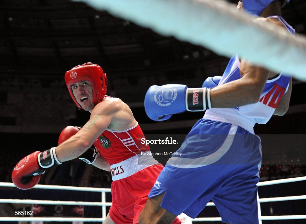4 October 2011; David Oliver Joyce, St Michael's Athy B.C., Kildare, representing Ireland, left, exchanges punches with Jai Bhagwan, India, during their 60kg bout. Joyce was defeated 32-30. 2011 AIBA World Boxing Championships - Last 16, David Oliver Joyce v Jai Bhagwan. Heydar Aliyev Sports and Exhibition Complex, Baku, Azerbaijan. Picture credit: Stephen McCarthy / SPORTSFILE