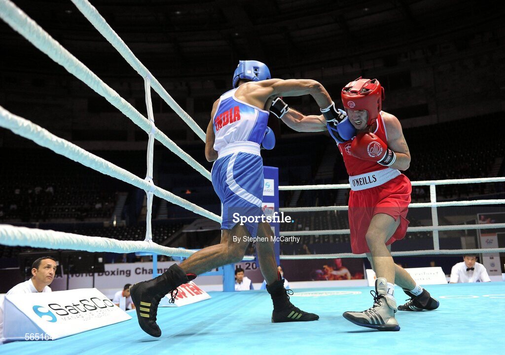 4 October 2011; David Oliver Joyce, St Michael's Athy B.C., Kildare, representing Ireland, right, exchanges punches with Jai Bhagwan, India, during their 60kg bout. Joyce was defeated 32-30. 2011 AIBA World Boxing Championships - Last 16, David Oliver Joyce v Jai Bhagwan. Heydar Aliyev Sports and Exhibition Complex, Baku, Azerbaijan. Picture credit: Stephen McCarthy / SPORTSFILE