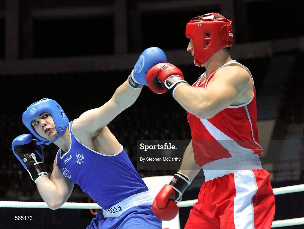 4 October 2011; Con Sheehan, Clonmel B.C., Tipperary, representing Ireland, left, exchanges punches with Roberto Cammerelle, Italy, during their 91+kg bout. Sheehan retired during the third round after visiting the medic twice. 2011 AIBA World Boxing Championships - Last 16, Con Sheehan v Roberto Cammerelle. Heydar Aliyev Sports and Exhibition Complex, Baku, Azerbaijan. Picture credit: Stephen McCarthy / SPORTSFILE