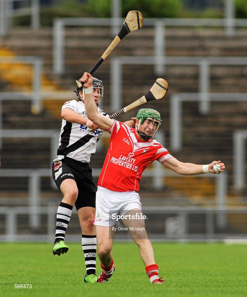 9 October 2011; Eddie McCloskey, Loughgiel Shamrocks, in action against Kieran O'Kane, Dungiven Kevin Lynchs. AIB GAA Hurling Ulster Senior Club Championship Semi-Final, Loughgiel v  Dungiven Kevin Lynchs, Casement Park, Belfast, Co. Antrim. Picture credit: Oliver McVeigh / SPORTSFILE