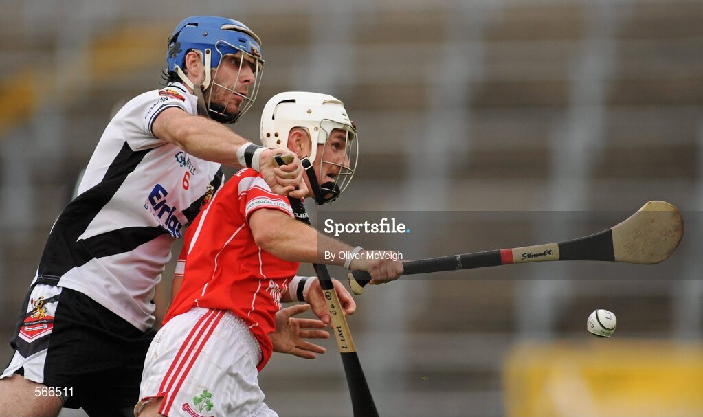 9 October 2011; Declan Laverty, Loughgiel Shamrocks, in action against Liam Og Hinphey, Dungiven Kevin Lynchs. AIB GAA Hurling Ulster Senior Club Championship Semi-Final, Loughgiel v  Dungiven Kevin Lynchs, Casement Park, Belfast, Co. Antrim. Picture credit: Oliver McVeigh / SPORTSFILE