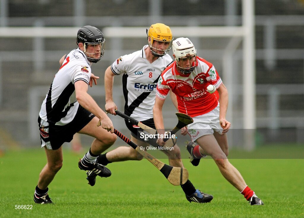 9 October 2011; James Campbell, Loughgiel Shamrocks, in action against Conal McCloskey and Paddy Kelly, right, Dungiven Kevin Lynchs. AIB GAA Hurling Ulster Senior Club Championship Semi-Final, Loughgiel v  Dungiven Kevin Lynchs, Casement Park, Belfast, Co. Antrim. Picture credit: Oliver McVeigh / SPORTSFILE