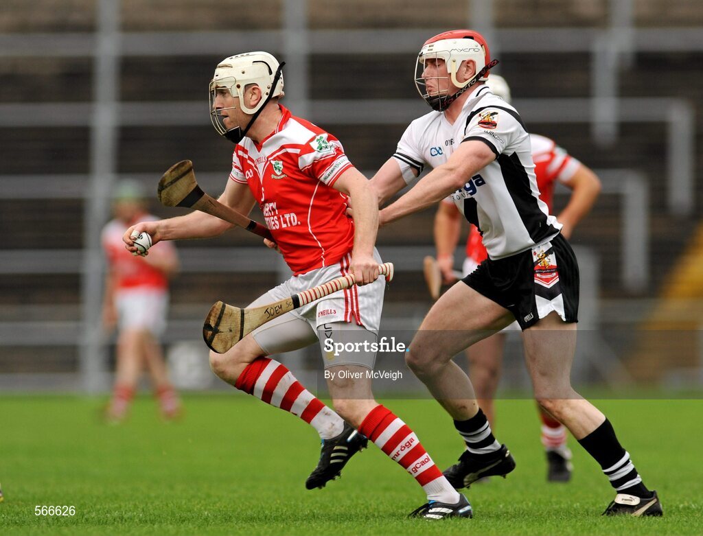 9 October 2011; Neill McGarry, Loughgiel Shamrocks, in action against Donal Kelly, Dungiven Kevin Lynchs. AIB GAA Hurling Ulster Senior Club Championship Semi-Final, Loughgiel Shamrocks v Dungiven Kevin Lynchs, Casement Park, Belfast, Co. Antrim. Picture credit: Oliver McVeigh / SPORTSFILE