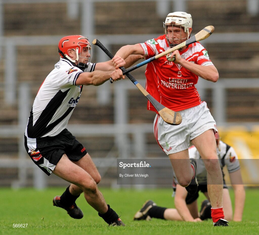 9 October 2011; James Campbell, Loughgiel Shamrocks, in action against Mark Craig, Dungiven Kevin Lynchs. AIB GAA Hurling Ulster Senior Club Championship Semi-Final, Loughgiel Shamrocks v Dungiven Kevin Lynchs, Casement Park, Belfast, Co. Antrim. Picture credit: Oliver McVeigh / SPORTSFILE