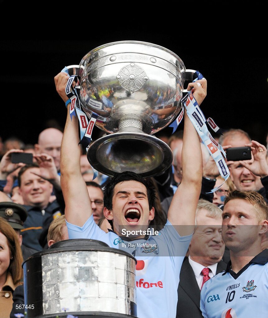 18 September 2011; Cian O'Sullivan, Dublin, lifts the Sam Maguire Cup. GAA Football All-Ireland Senior Championship Final, Kerry v Dublin, Croke Park, Dublin. Picture credit: Ray McManus / SPORTSFILE
