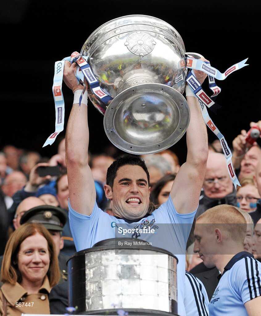 18 September 2011; Ross McConnell, Dublin, lifts the Sam Maguire Cup. GAA Football All-Ireland Senior Championship Final, Kerry v Dublin, Croke Park, Dublin. Picture credit: Ray McManus / SPORTSFILE