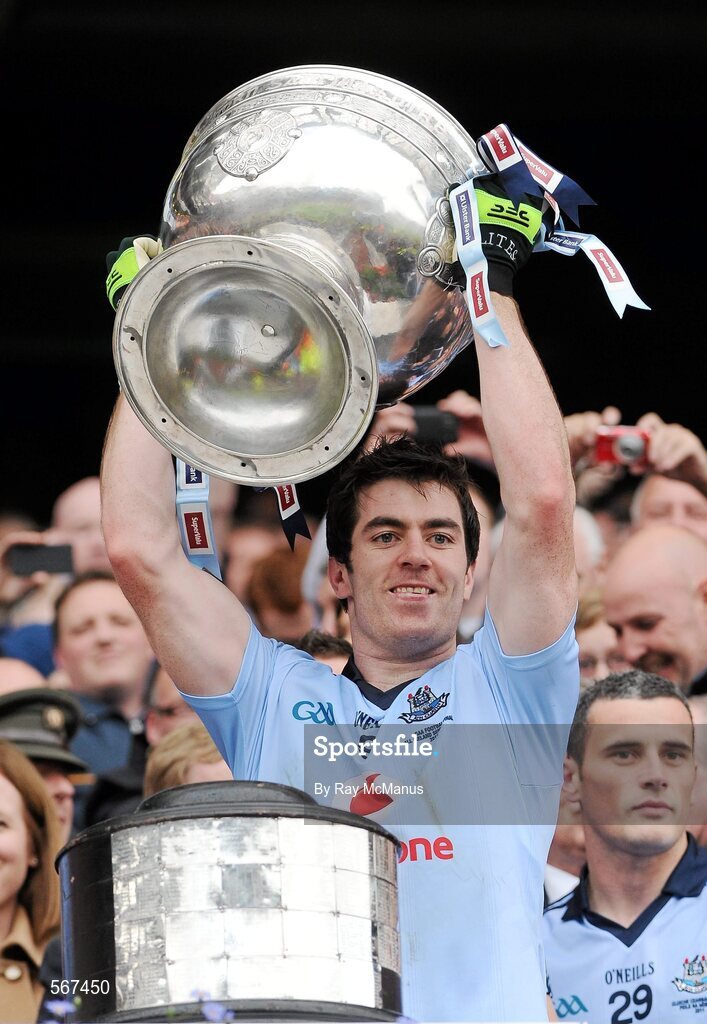 18 September 2011; Michael Darragh Macauley, Dublin, lifts the Sam Maguire Cup. GAA Football All-Ireland Senior Championship Final, Kerry v Dublin, Croke Park, Dublin. Picture credit: Ray McManus / SPORTSFILE