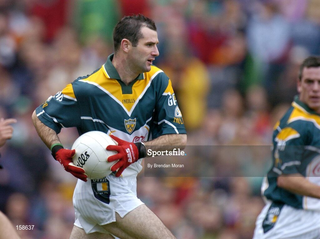 17 October 2004; Steven McDonnell, Ireland, in action against Australia. Coca Cola International Rules Series 2004, First Test, Ireland v Australia, Croke Park, Dublin. Picture credit; Brendan Moran / SPORTSFILE *** Local Caption *** Any photograph taken by SPORTSFILE during, or in connection with, the 2004 Coca Cola International Rules Series which displays GAA logos or contains an image or part of an image of any GAA intellectual property, or, which contains images of a GAA player/players in their playing uniforms, may only be used for editorial and non-advertising purposes.  Use of photographs for advertising, as posters or for purchase separately is strictly prohibited unless prior written approval has been obtained from the Gaelic Athletic Association.