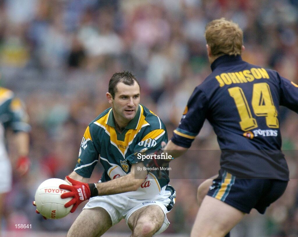 17 October 2004; Steven McDonnell, Ireland, in action against Jason Johnson, Australia. Coca Cola International Rules Series 2004, First Test, Ireland v Australia, Croke Park, Dublin. Picture credit; Brendan Moran / SPORTSFILE *** Local Caption *** Any photograph taken by SPORTSFILE during, or in connection with, the 2004 Coca Cola International Rules Series which displays GAA logos or contains an image or part of an image of any GAA intellectual property, or, which contains images of a GAA player/players in their playing uniforms, may only be used for editorial and non-advertising purposes.  Use of photographs for advertising, as posters or for purchase separately is strictly prohibited unless prior written approval has been obtained from the Gaelic Athletic Association.