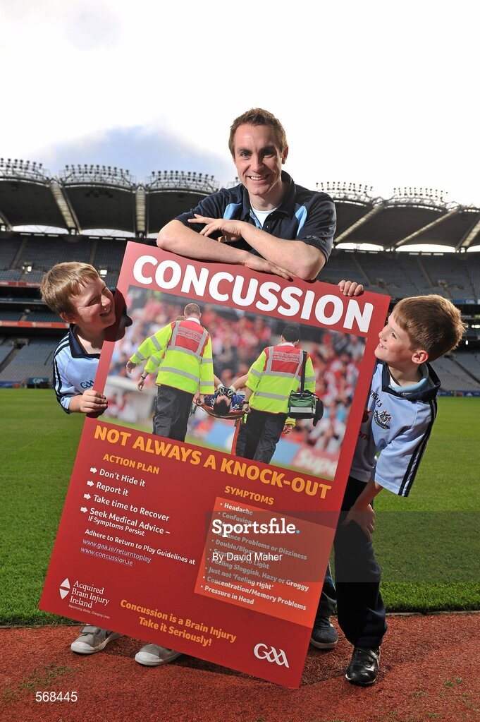 19 October 2011; The GAA has teamed up with brain injury specialists Acquired Brain Injury Ireland to back their Mind Your Head campaign; educating players about the signs and symptoms of Concussion, through an Educational Concussion Poster Campaign. This poster campaign will be distributed to over 1800 GAA clubs throughout the country, reaching out to all players of every age and level. Present at the launch were Dublin Footballer Paul Griffin, with Sean O'Connell, left, age 9 from Stepaside, Co. Dublin and Mark Bailey, age 8 from Killiney, Co. Dublin. GAA and ABI Ireland Launch Concussion Awareness Campaign, Croke Park, Dublin. Picture credit: David Maher / SPORTSFILE
