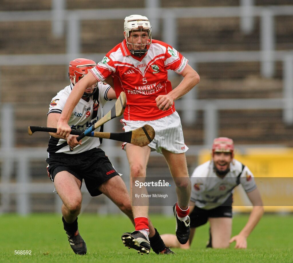 9 October 2011; James Campbell, Loughgiel Shamrocks, in action against Mark Craig, Dungiven Kevin Lynchs. AIB GAA Hurling Ulster Senior Club Championship Semi-Final, Loughgiel v  Dungiven Kevin Lynchs, Casement Park, Belfast, Co. Antrim. Picture credit: Oliver McVeigh / SPORTSFILE