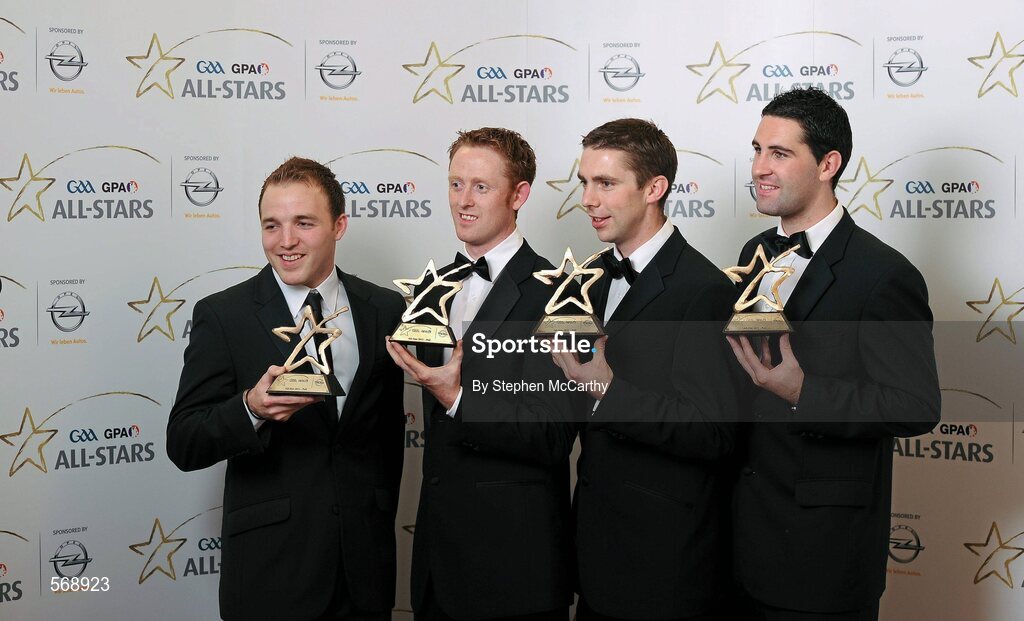 21 October 2011; Kerry footballers, from left, Darran O'Sullivan, Colm Cooper, Marc O Sé and Bryan Sheehan with their GAA GPA All-Star awards at the GAA GPA All-Star Awards 2011 sponsored by Opel. National Convention Centre, Dublin. Picture credit: Stephen McCarthy / SPORTSFILE