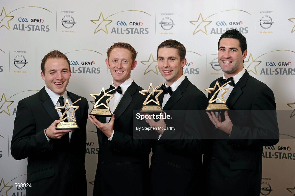 21 October 2011; Kerry footballers, from left, Darran O'Sullivan, Colm Cooper, Marc O Sé and Bryan Sheehan with their GAA GPA All-Star awards at the GAA GPA All-Star Awards 2011 sponsored by Opel. National Convention Centre, Dublin. Picture credit: Stephen McCarthy / SPORTSFILE