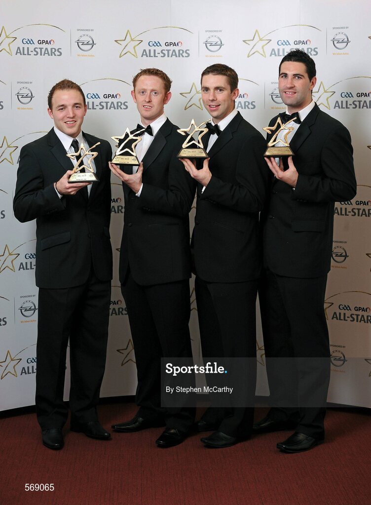 21 October 2011; Kerry footballers, from left, Darran O'Sullivan, Colm Cooper, Marc O Sé and Bryan Sheehan with their GAA GPA All-Star awards at the GAA GPA All-Star Awards 2011 sponsored by Opel. National Convention Centre, Dublin. Picture credit: Stephen McCarthy / SPORTSFILE