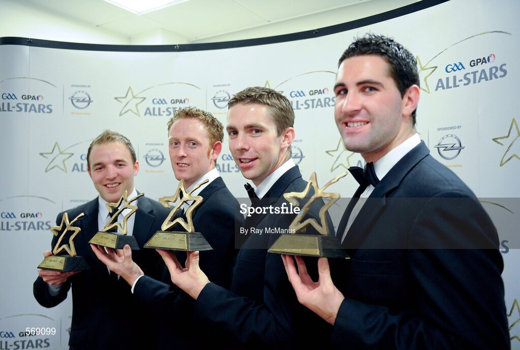 21 October 2011; Kerry footballers, from left, Darran O'Sullivan, Colm Cooper, Marc O Sé and Bryan Sheehan with their GAA GPA All-Star awards at the GAA GPA All-Star Awards 2011 sponsored by Opel. National Convention Centre, Dublin. Picture credit: Ray McManus / SPORTSFILE