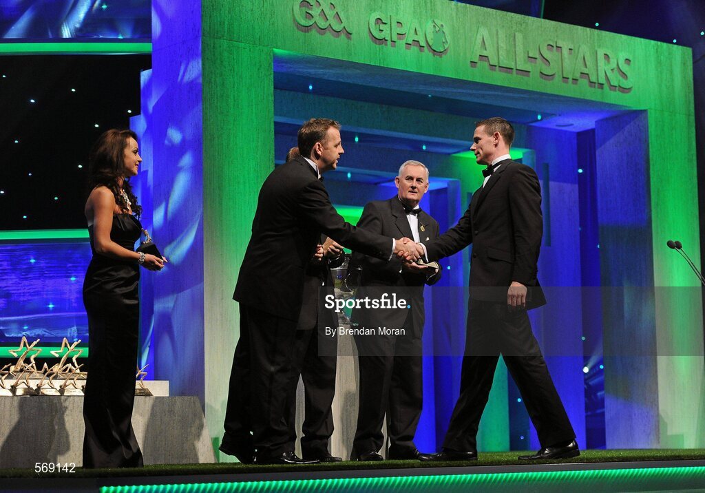 21 October 2011; Dublin's Stephen Cluxton is greeted by Dave Sheeran, Managing Director, Opel Ireland, before receiving his award from Uachtarán CLG Criostóir Ó Cuana at the GAA GPA All-Star Awards 2011 sponsored by Opel. National Convention Centre, Dublin. Picture credit: Brendan Moran / SPORTSFILE