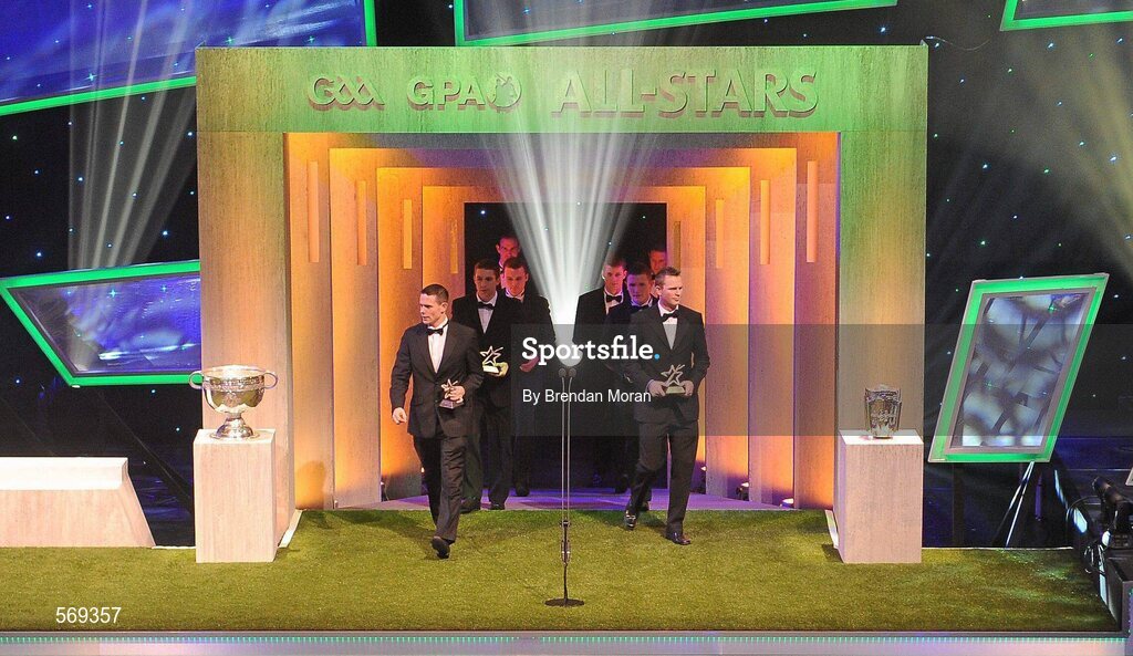 21 October 2011; The 30 GAA GPA All Star award winners, led by goalkeepers Stephen Cluxton, left, and Gary Maguire, both of Dublin, walk back onto the stage at the end of the ceremony, at the GAA GPA All-Star Awards 2011 sponsored by Opel. National Convention Centre, Dublin. Picture credit: Brendan Moran / SPORTSFILE