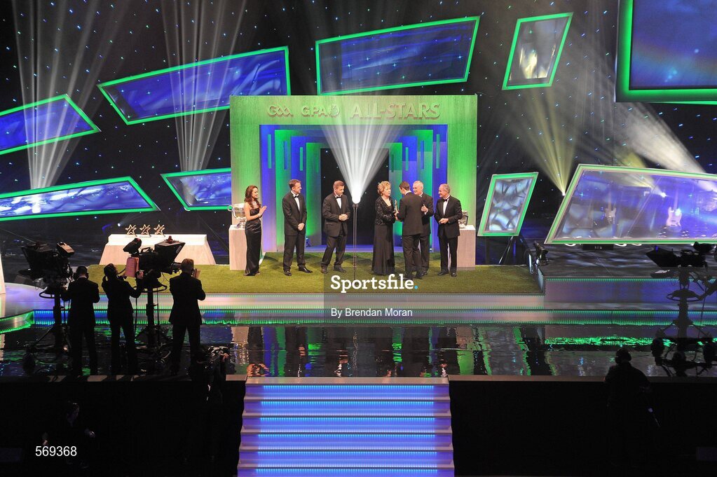 21 October 2011; Dublin hurler Liam Rushe is presented with the GAA GPA Young Hurler of the Year by President Mary McAleese, in the company of, from left, Dave Sheeran, Managing Director, Opel Ireland, Dessie Farrell, Chief Executive, GPA, Uachtarán CLG Criostóir Ó Cuana and Martin McAleese, at the GAA GPA All-Star Awards 2011 sponsored by Opel. National Convention Centre, Dublin. Picture credit: Brendan Moran / SPORTSFILE