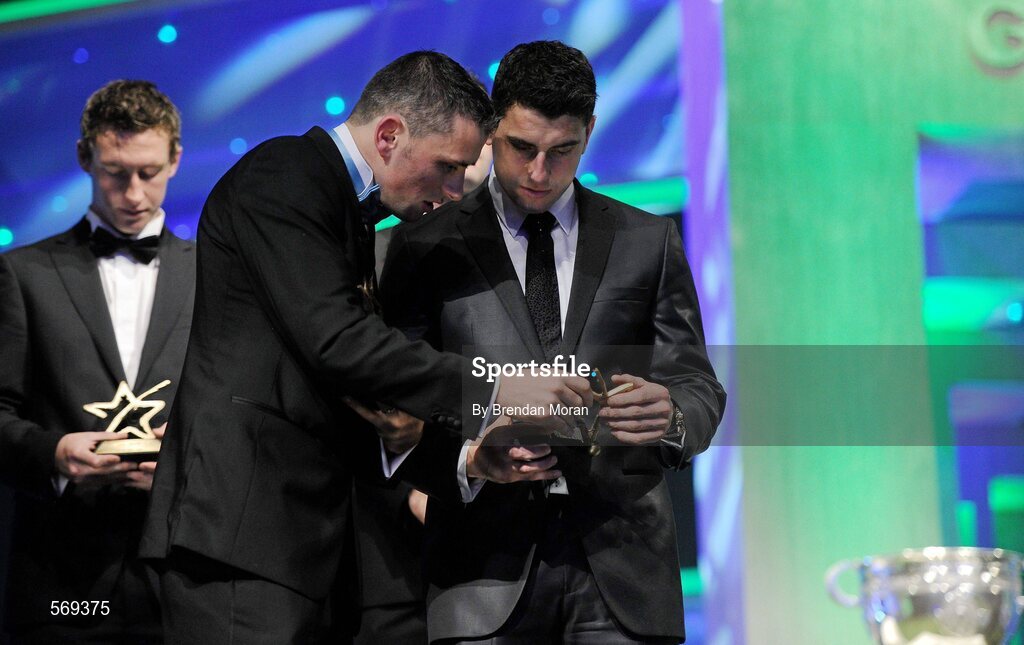 21 October 2011; Brothers and Dublin footballers Alan and Bernard Brogan check their awards at the GAA GPA All-Star Awards 2011 sponsored by Opel. National Convention Centre, Dublin. Picture credit: Brendan Moran / SPORTSFILE