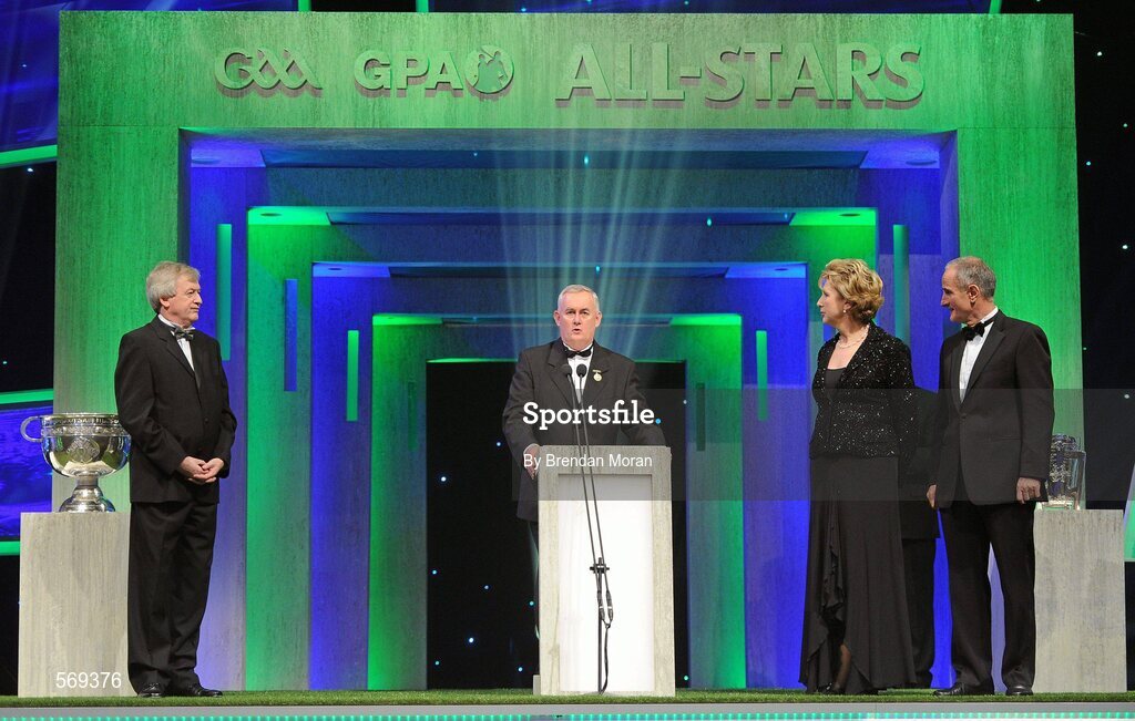 21 October 2011; Uachtarán CLG Criostóir Ó Cuana, in the company of Ard Stiúrthóir of the GAA Páraic Duffy, left, and Martin McAleese, right, makes a speech to recognise the contribution of President Mary McAleese to the GAA and Ireland during her term of office, at the GAA GPA All-Star Awards 2011 sponsored by Opel. National Convention Centre, Dublin. Picture credit: Brendan Moran / SPORTSFILE