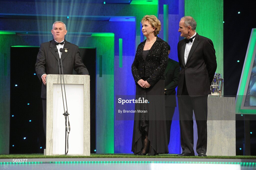 21 October 2011; Uachtarán CLG Criostóir Ó Cuana, in the company of and Martin McAleese, makes a speech to recognise the contribution of President Mary McAleese to the GAA and Ireland during her term of office, at the GAA GPA All-Star Awards 2011 sponsored by Opel. National Convention Centre, Dublin. Picture credit: Brendan Moran / SPORTSFILE