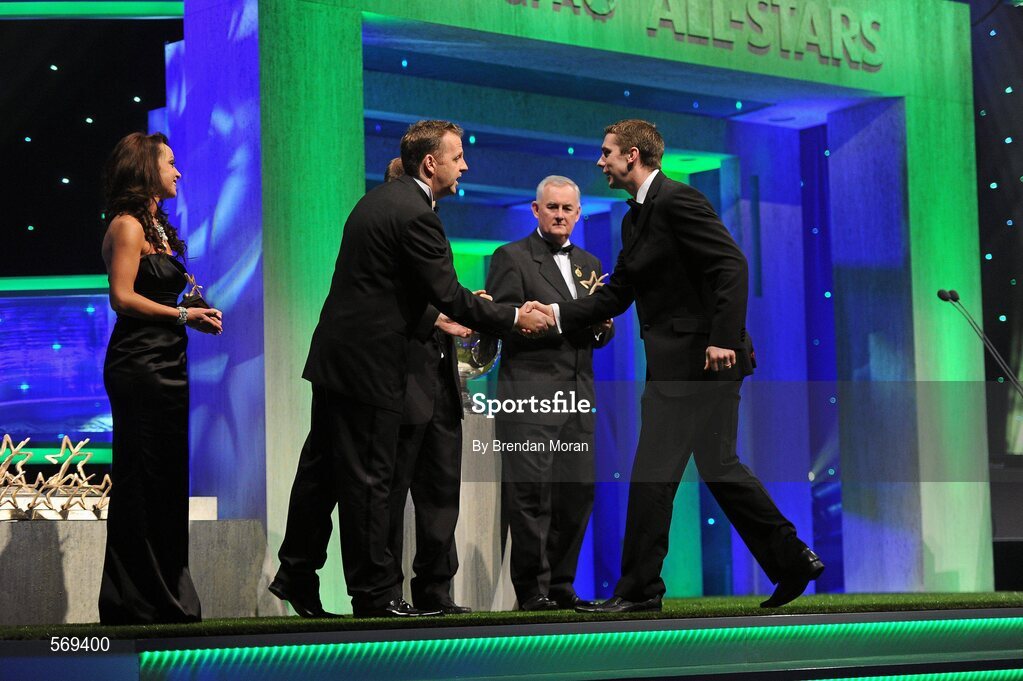 21 October 2011; kerry footballer Marc O Sé is greeted by Dave Sheeran, Managing Director, Opel Ireland, before receiving his award from Uachtarán CLG Criostóir Ó Cuana at the GAA GPA All-Star Awards 2011 sponsored by Opel. National Convention Centre, Dublin. Picture credit: Brendan Moran / SPORTSFILE