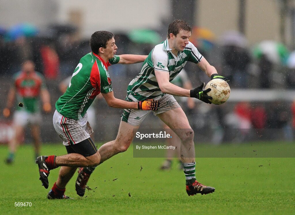23 October 2011; Fiachra Spellman, Mullingar Shamrocks, in action against Mark McCallon, Garrycastle. Westmeath County Senior Football Championship Final, Garrycastle v Mullingar Shamrocks, Cusack Park, Mullingar, Co. Westmeath. Picture credit: Stephen McCarthy / SPORTSFILE